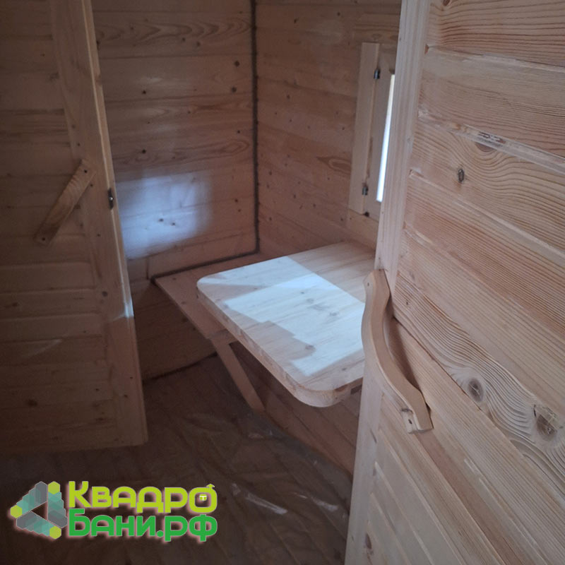 Квадро-Баня 4 х 2,2 м цвет Тик +ДОПЫ: козырёк (над дверью), дверь входная деревянная Стандарт, козырёк (над форточкой), печь на дровах «Везувий Лава», забор вокруг печи (ель) — изображение 21